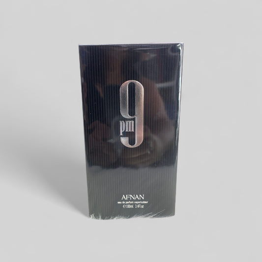 Afnan 9pm perfume packaging on a light gray background