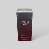 Armani Code perfume packaging on a gray background