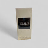 Carolina Herrera Chic for Men perfume packaging on a light gray background