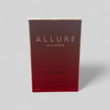 Chanel Allure Homme perfume box on a gray background