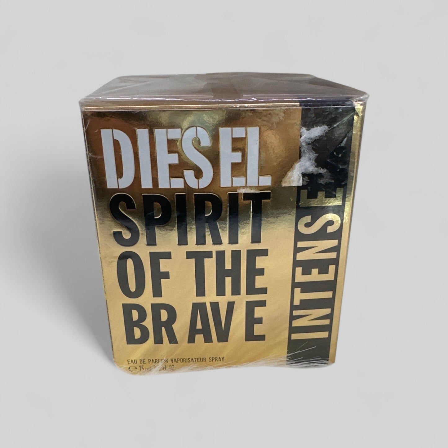 Packaged product with 'Diesel Spirit of the Brave Intense' text on a gray background