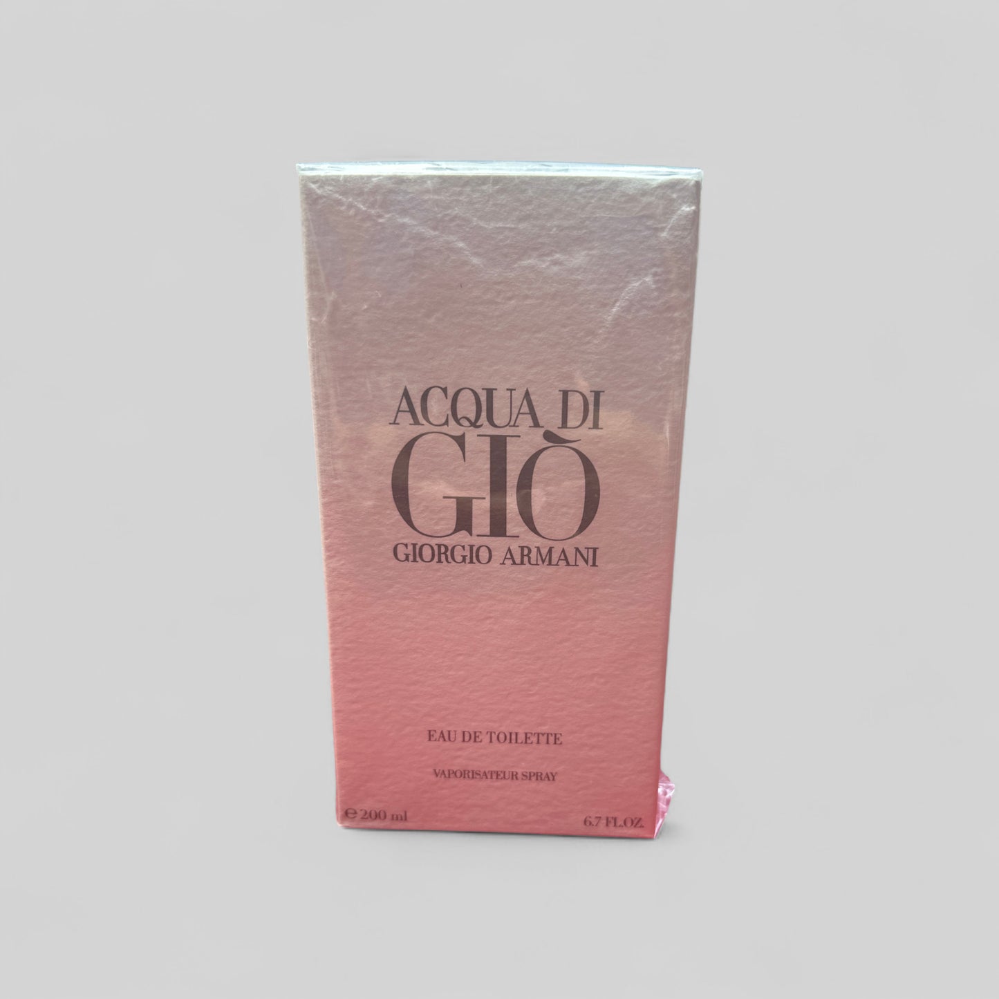 Giorgio Armani Acqua di Gio Eau de Toilette packaging on a gray background