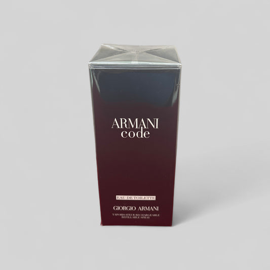 Armani Code perfume packaging on a gray background