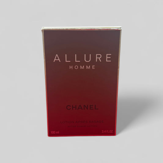 Chanel Allure Homme perfume box on a gray background