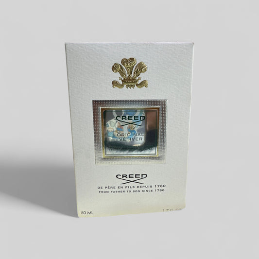 Creed Original Vetiver perfume bottle packaging on a light gray background
