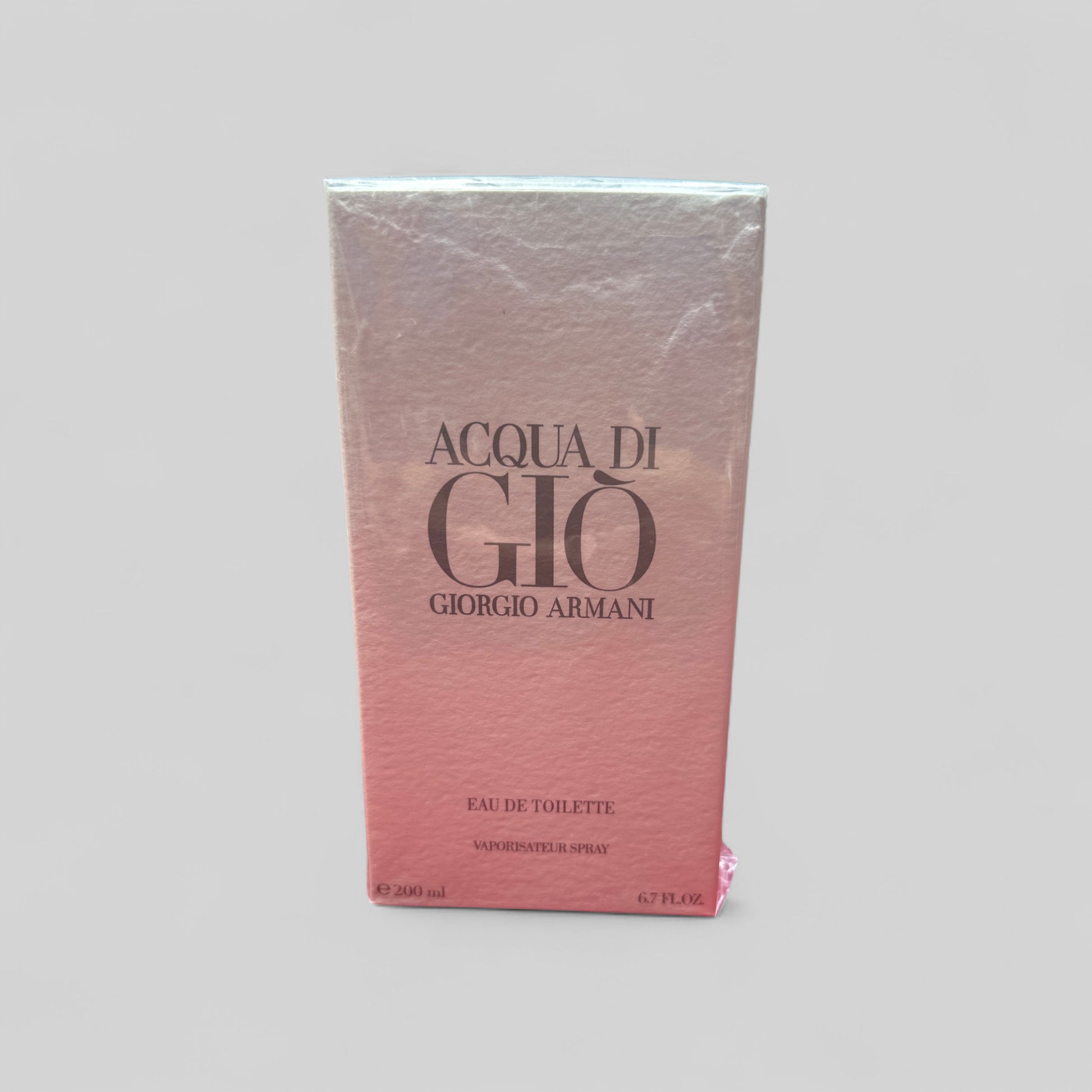 Giorgio Armani Acqua di Gio Eau de Toilette packaging on a gray background