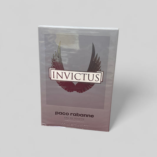 Paco Rabanne Invictus perfume packaging on a light gray background