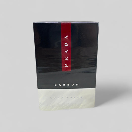 Prada Carbon Luna Rossa packaging on a gray background