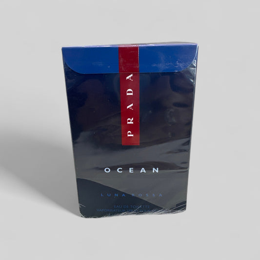 Prada Luna Rossa Ocean packaging on a gray background